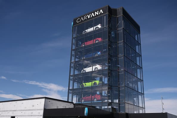 Stocks making biggest moves premarket: Carvana, eBay, Microsoft, Uber Technologies and more